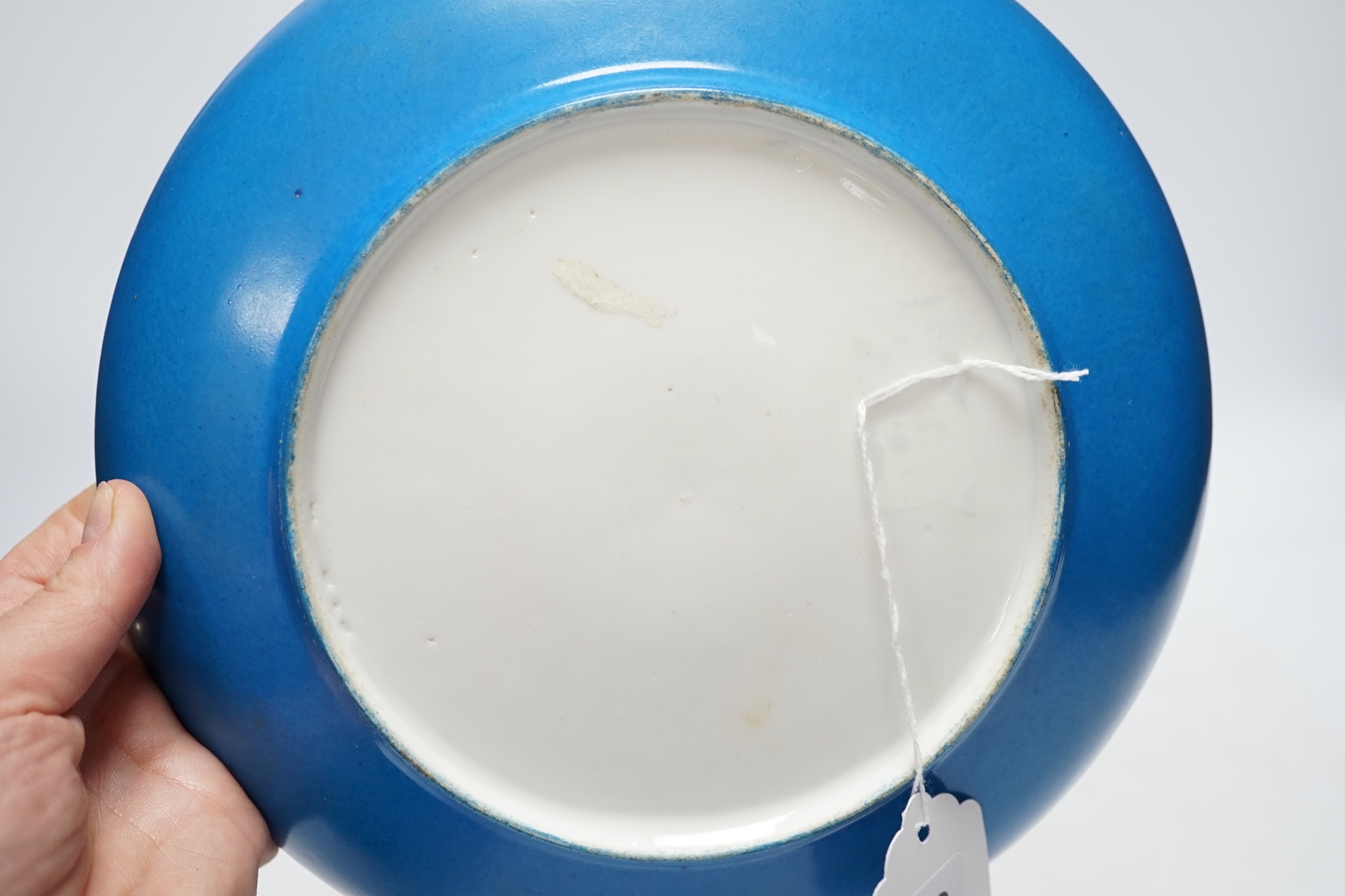 A Sevres style dish with ormolu mounted foot, 22cm diameter